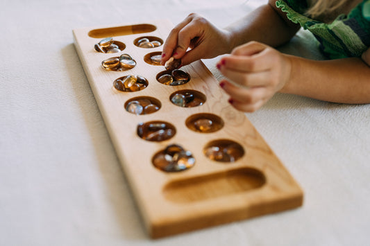Mancala "Busy Bees" game board