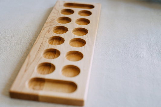 Mancala "Busy Bees" game board